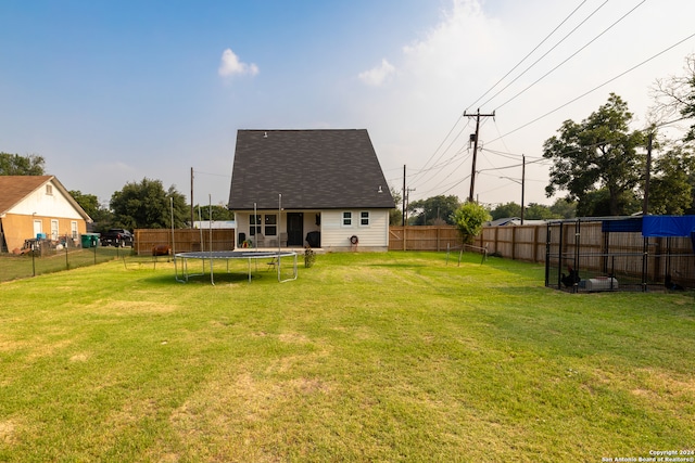 view of yard featuring a trampoline