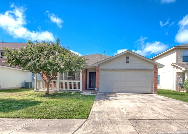 single story home featuring a porch, a garage, central AC unit, and a front lawn