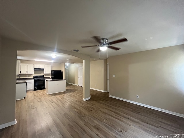 kitchen featuring white cabinets, black appliances, ceiling fan, light hardwood / wood-style flooring, and sink