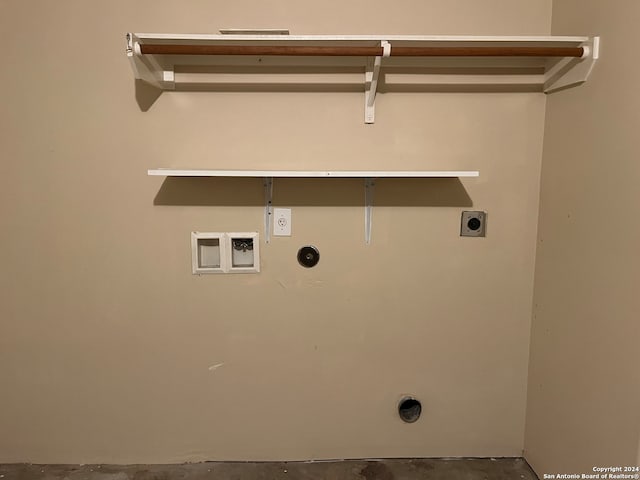 washroom with washer hookup, hookup for a gas dryer, and electric dryer hookup