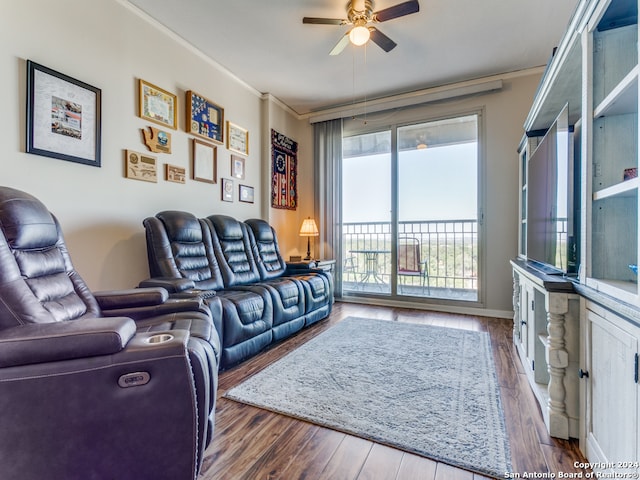 living room featuring ceiling fan, crown molding, and hardwood / wood-style floors