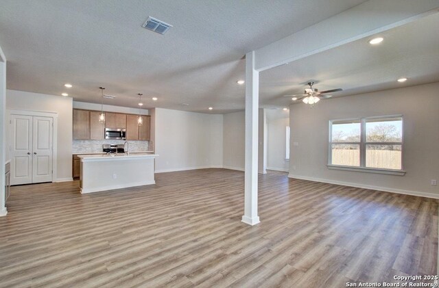 unfurnished room with french doors and dark hardwood / wood-style flooring