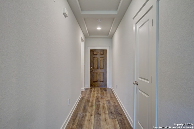 corridor with light hardwood / wood-style flooring