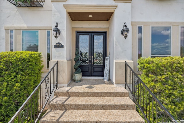 doorway to property featuring french doors