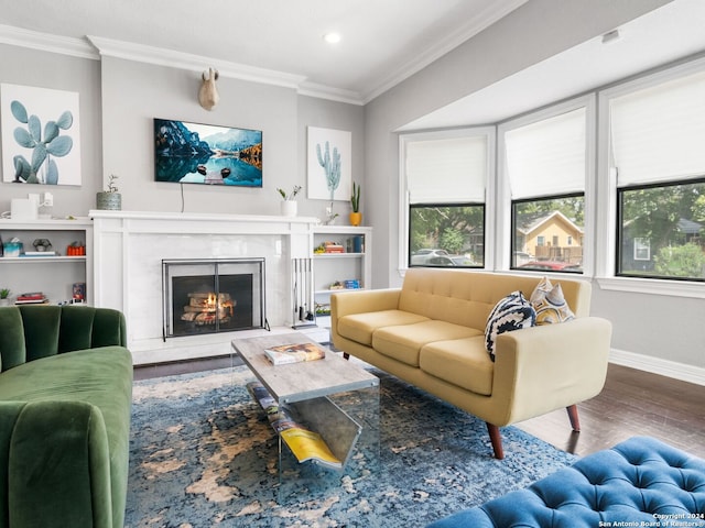 living room with crown molding and hardwood / wood-style floors