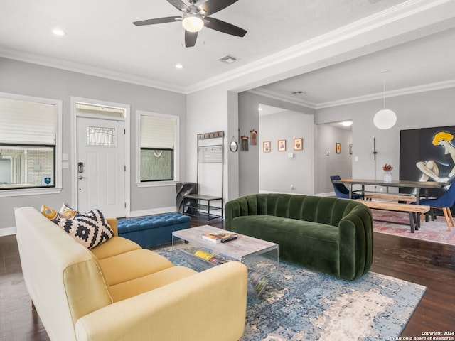 living room featuring crown molding, dark hardwood / wood-style flooring, and ceiling fan