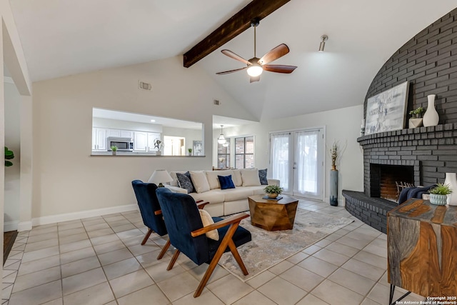 tiled living room featuring a fireplace, beam ceiling, high vaulted ceiling, and ceiling fan