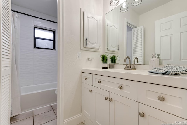 bathroom featuring vanity, shower / tub combo, and tile patterned flooring