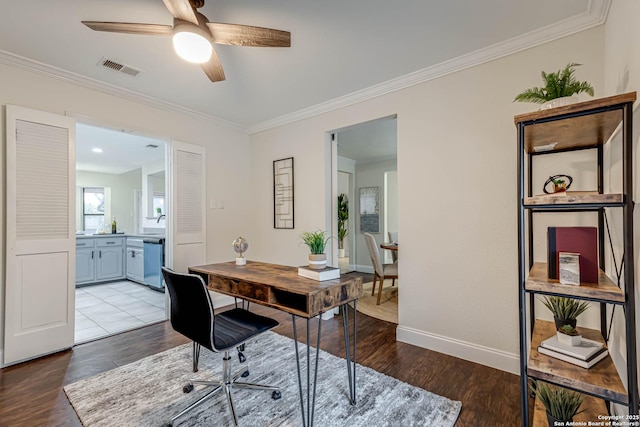 office area featuring ceiling fan, light hardwood / wood-style flooring, and crown molding