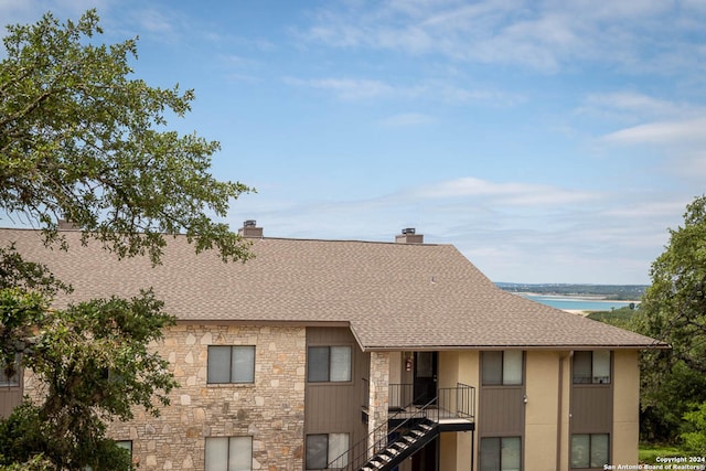 view of building exterior featuring a water view