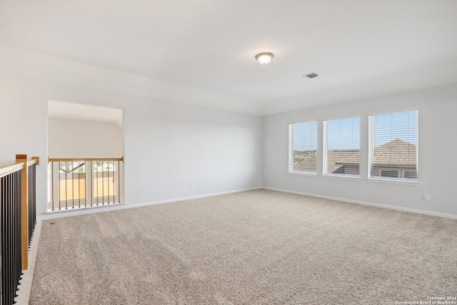 spare room featuring carpet flooring