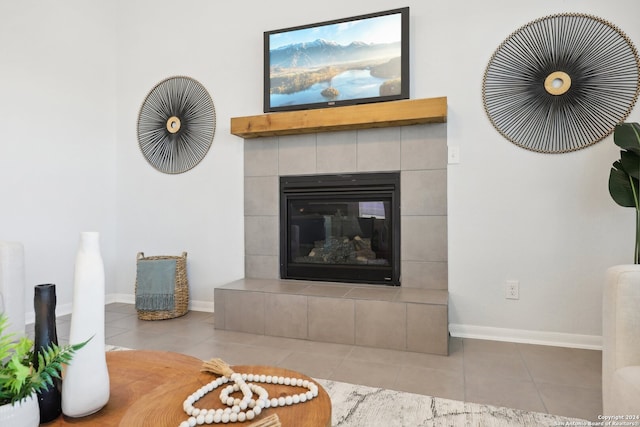 tiled living room featuring a tile fireplace