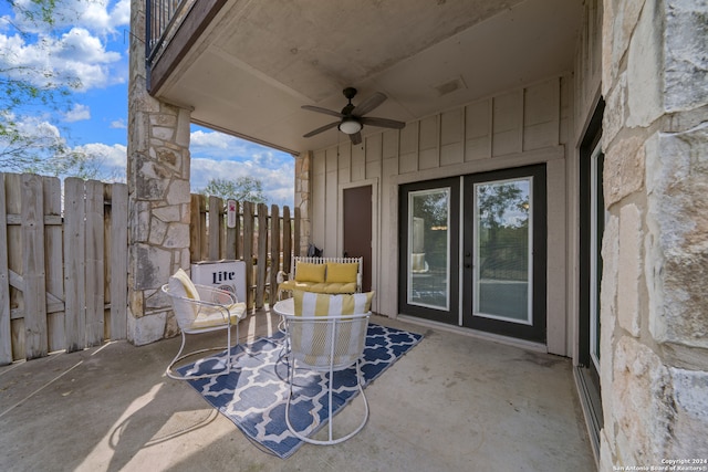 view of patio / terrace featuring ceiling fan