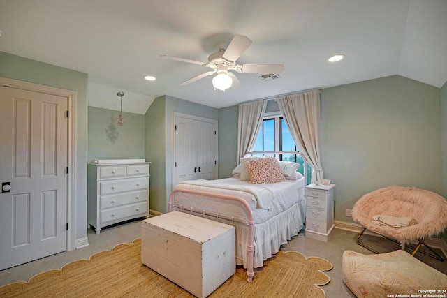 carpeted bedroom featuring ceiling fan and lofted ceiling