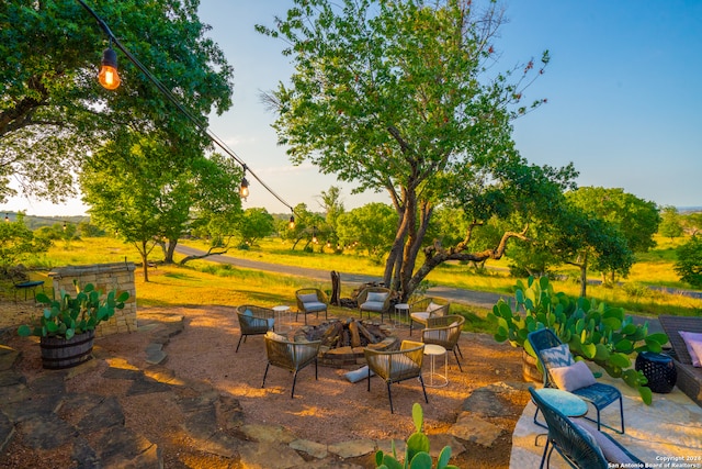 view of patio featuring an outdoor fire pit