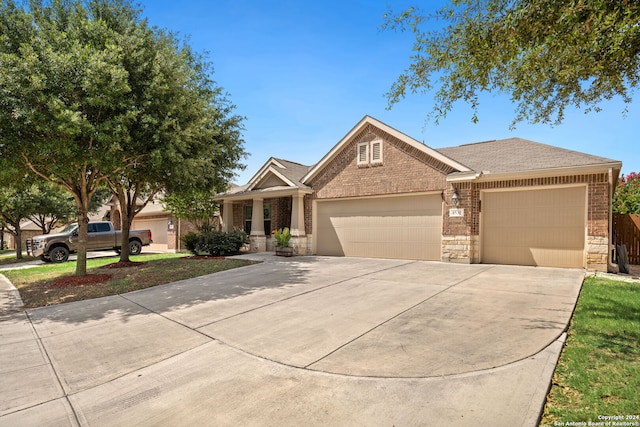 view of front of property featuring a garage