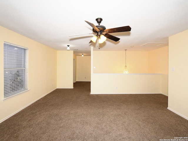 carpeted empty room featuring ceiling fan