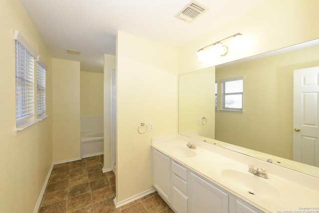 bathroom featuring vanity