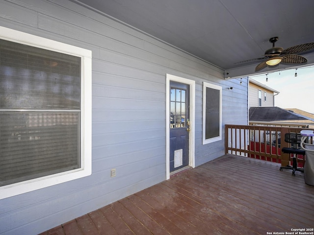 wooden terrace with ceiling fan