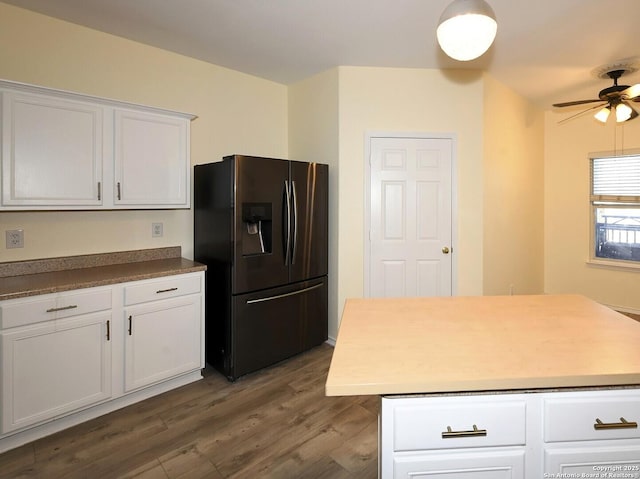 kitchen with stainless steel fridge with ice dispenser, white cabinets, dark wood-type flooring, and ceiling fan