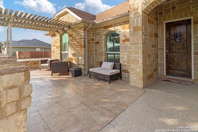 view of patio / terrace featuring a pergola and outdoor lounge area