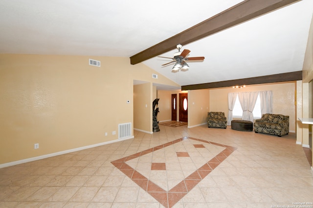 living room featuring lofted ceiling with beams, ceiling fan, and light tile patterned floors