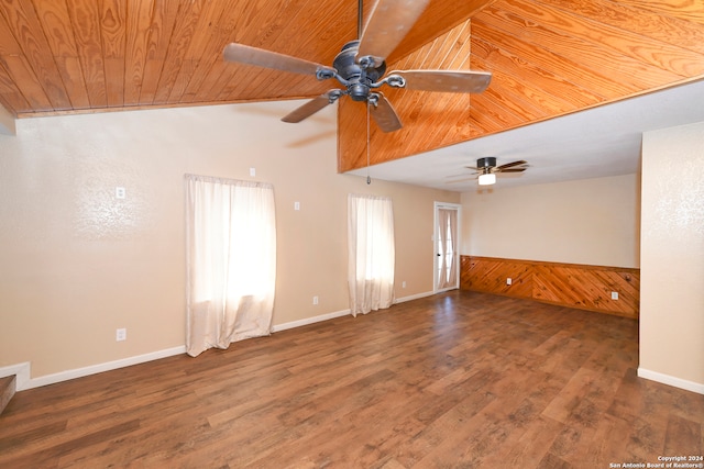 unfurnished room featuring dark hardwood / wood-style flooring, wood ceiling, vaulted ceiling, and ceiling fan