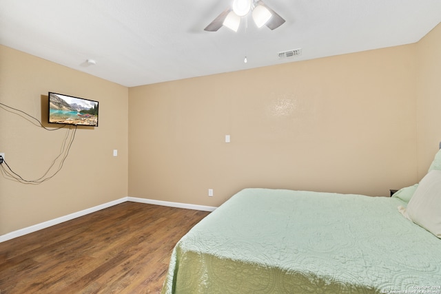 bedroom featuring wood-type flooring and ceiling fan