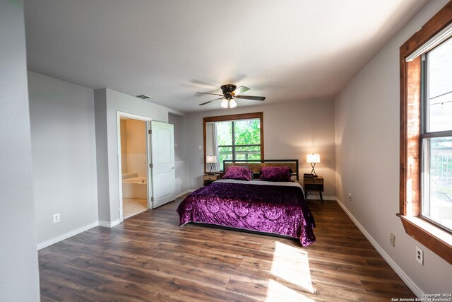 355 Mountain Creek Rd, Pipe Creek, TX 78063 - bedroom featuring wood finished floors, baseboards, a ceiling fan, and ensuite bathroom