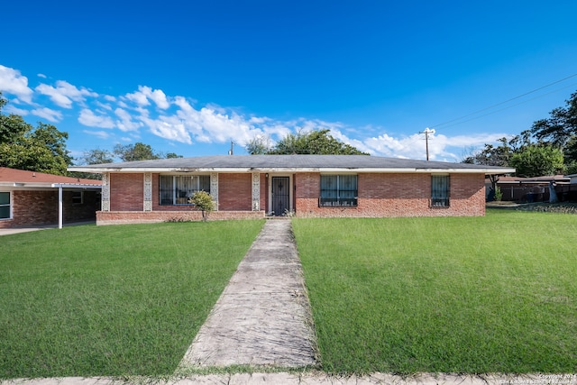 ranch-style home featuring a front yard