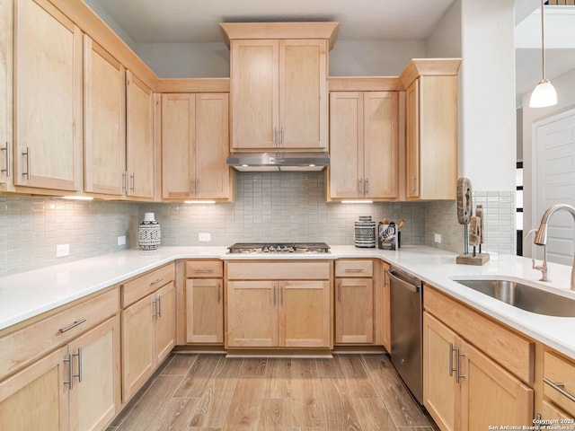 kitchen featuring light brown cabinets, visible vents, a sink, and appliances with stainless steel finishes
