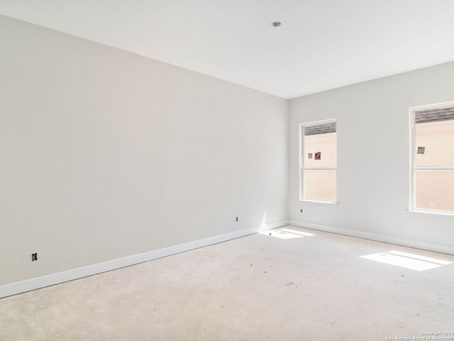 empty room featuring concrete floors