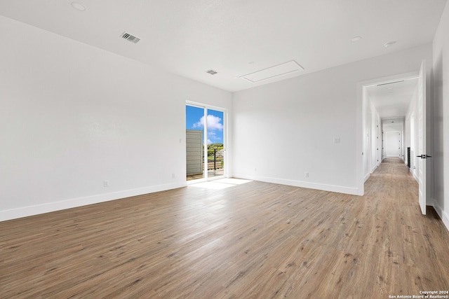 unfurnished room featuring light wood-type flooring