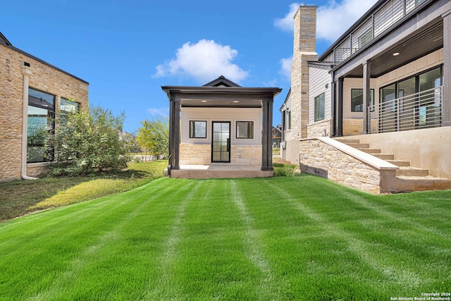 exterior space with a lawn