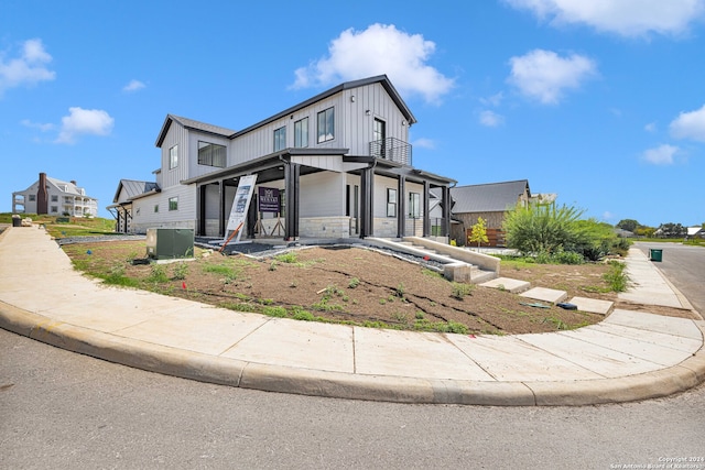 view of front of property featuring cooling unit