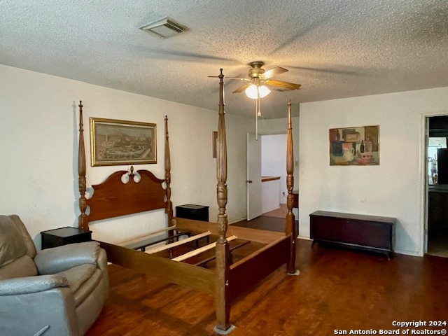 bedroom featuring visible vents and a textured ceiling