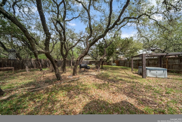 view of yard featuring a fenced backyard