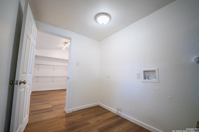 laundry area with washer hookup and dark wood-type flooring