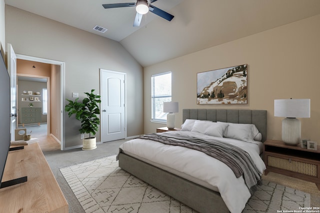 carpeted bedroom featuring ceiling fan and vaulted ceiling