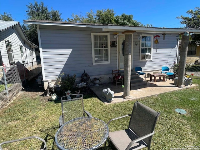 exterior space featuring a patio and a front yard