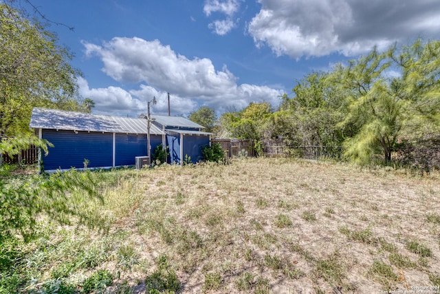 view of yard with central AC