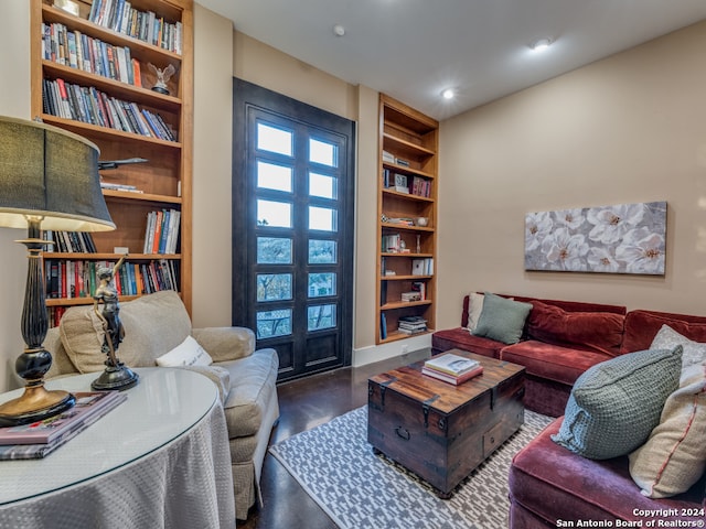 living room featuring built in shelves