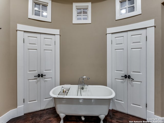 bathroom featuring a bath