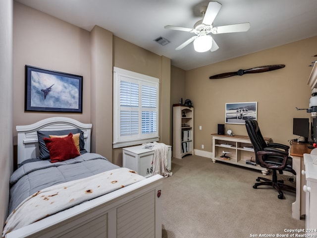 carpeted bedroom featuring ceiling fan