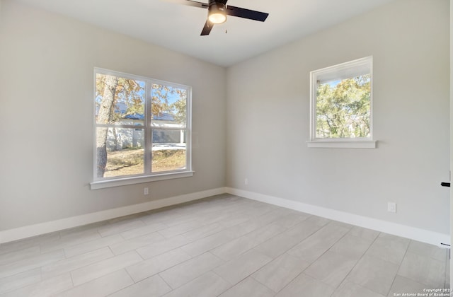 empty room featuring ceiling fan