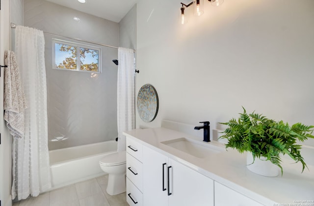 full bathroom featuring shower / tub combo, vanity, toilet, and tile patterned floors