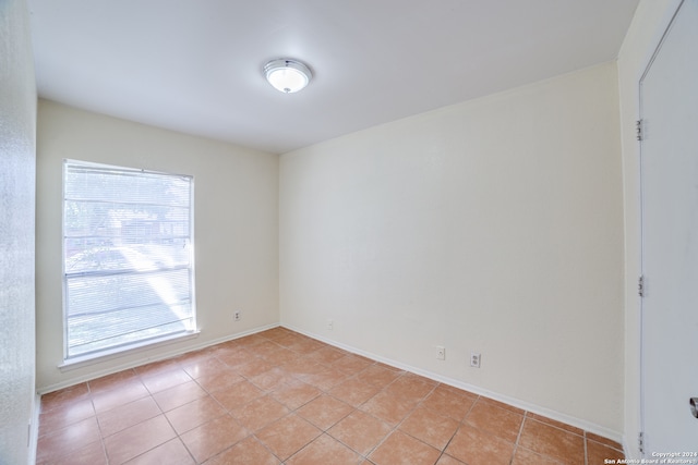 view of tiled spare room