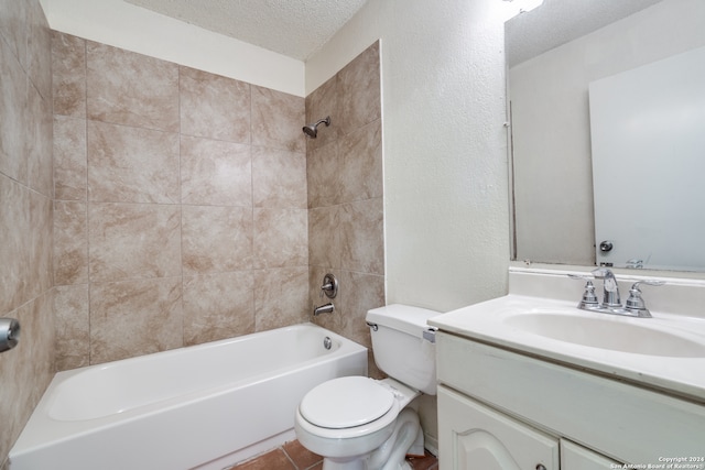 full bathroom with vanity, a textured ceiling, tiled shower / bath combo, tile patterned flooring, and toilet