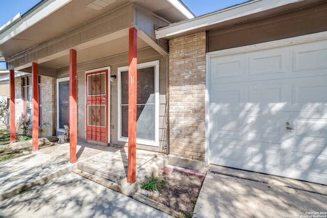 entrance to property with a garage