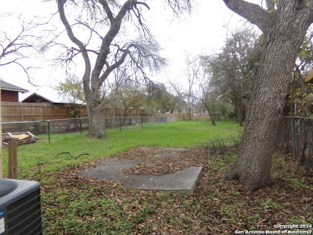 view of yard featuring central AC